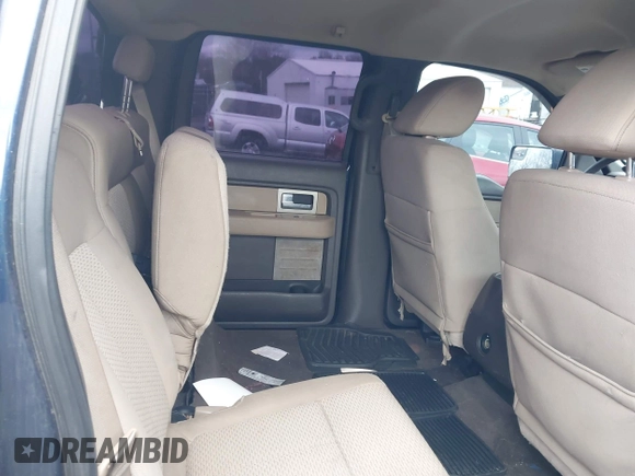 2009 Ford F-150 XL with VIN 1FTPW12V59FA18709, listed as a IAAI auction lot 42053057 with 156,035 mi miles. Bid and sale history available at carsss.com. Image 8.