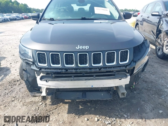 2018 Jeep Compass Sport with VIN 3C4NJDAB2JT136225, listed as a IAAI auction lot 42279668 with 145,967 mi miles and . Bid and sale history available at DreamBid. Image 18.