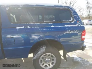 2011 Ford Ranger XLT with VIN 1FTLR4FE9BPA51147, listed as a IAAI auction lot 41351215 with 105,562 mi miles. Bid and sale history available at carsss.com. Image 20.