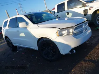 2013 Dodge Durango SXT with VIN 1C4RDJAGXDC564904, listed as a IAAI auction lot 41833540 with 208,581 mi miles. Bid and sale history available at carsss.com. Image 1.