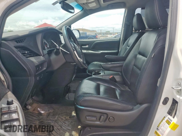 2017 Toyota Sienna SE with VIN 5TDXZ3DC9HS821990, listed as a Copart auction lot 60912365 with 182,672 mi miles and Salvage title. Bid and sale history available at DreamBid. Image 7.