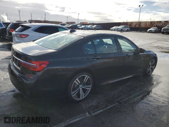 2017 BMW 7 Series 740i with VIN WBA7E2C59HG739788, listed as a Copart auction lot 48073105 with 36,274 mi miles and Salvage Title. Bid and sale history available at carsss.com. Image 3.