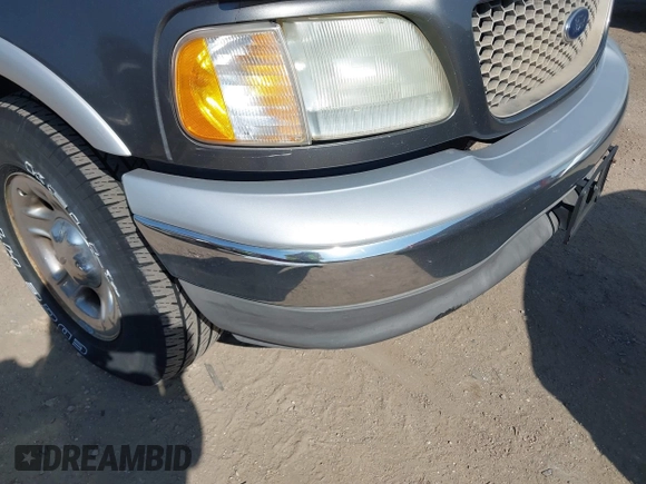 2003 Ford F-150 XL with VIN 1FTRX17L33NB61748, listed as a IAAI auction lot 41789730 with 301,092 mi miles. Bid and sale history available at carsss.com. Image 16.