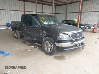 2002 Ford F-150 XL with VIN 1FTRX17242NB82159, listed as a IAAI auction lot 42283839 with 163,685 mi miles and . Bid and sale history available at DreamBid. Image 1.