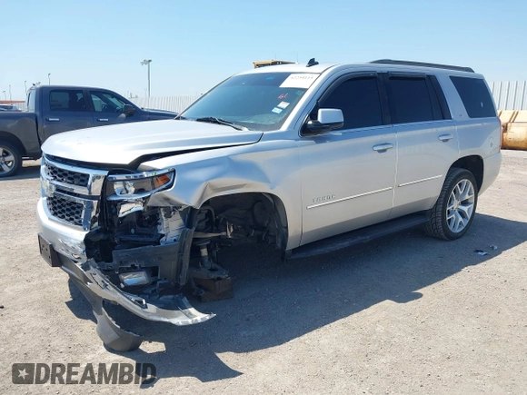 2015 Chevrolet Tahoe LT with VIN 1GNSCBKC6FR303850, listed as a IAAI auction lot 42254115 with 147,856 mi miles and . Bid and sale history available at DreamBid. Image 18.