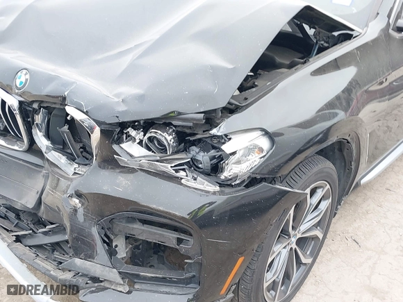 2019 BMW X4 xDrive30i with VIN 5UXUJ3C58KLG55968, listed as a IAAI auction lot 41286393 with 60,785 mi miles. Bid and sale history available at carsss.com. Image 6.