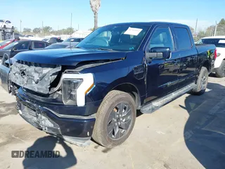 2022 Ford F-150 Lightning Pro z VIN 1FT6W1EV8NWG04113, wystawiony jako IAAI lot #41765532 z przebiegiem 48 990 mil mil oraz . Historia ofert i sprzedaży dostępna na DreamBid. Obrazek 23.