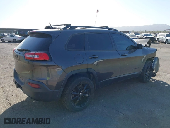 2014 Jeep Cherokee Latitude with VIN 1C4PJMCBXEW317384, listed as a IAAI auction lot 41621635 with 180,971 mi miles and . Bid and sale history available at DreamBid. Image 4.
