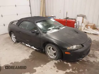 1999 Mitsubishi Eclipse GS with VIN 4A3AX35G3XE061702, listed as a IAAI auction lot 41323151 with 155,941 mi miles. Bid and sale history available at carsss.com. Image 1.