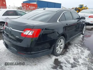 2011 Ford Taurus SEL with VIN 1FAHP2EW1BG114726, listed as a IAAI auction lot 41689674 with 312,338 mi miles. Bid and sale history available at carsss.com. Image 4.