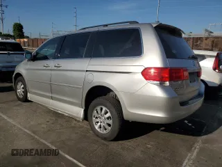 2009 Honda Odyssey EX-L with VIN 5FNRL38619B044063, listed as a Copart auction lot 52372505 with 204,658 mi miles and Salvage Title. Bid and sale history available at DreamBid. Image 2.