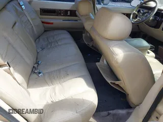 1996 Cadillac Fleetwood z VIN 1G6DW52PXTR705592, wystawiony jako IAAI lot #42290586 z przebiegiem Nie podano mil oraz . Historia ofert i sprzedaży dostępna na DreamBid. Obrazek 8.