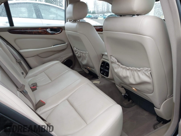 2004 Jaguar XJ with VIN SAJWA71C94SG29019, listed as a IAAI auction lot 41664978 with 133,546 mi miles. Bid and sale history available at carsss.com. Image 8.