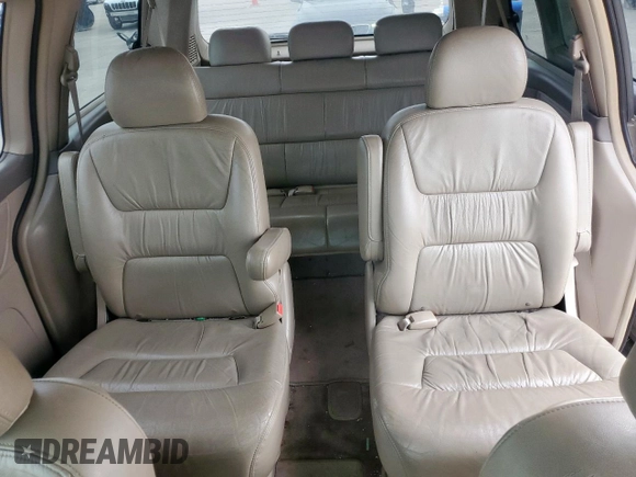 2004 Honda Odyssey EX-L with VIN 5FNRL18944B107051, listed as a Copart auction lot 58542335 with 207,951 mi miles and Salvage title. Bid and sale history available at DreamBid. Image 10.