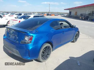 2015 Scion tC with VIN JTKJF5C77F3088828, listed as a IAAI auction lot 41846399 with 203,677 mi miles. Bid and sale history available at carsss.com. Image 4.