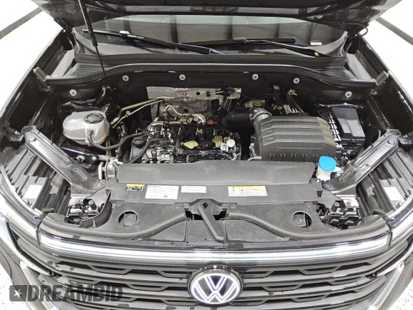 2024 Volkswagen Atlas SE z VIN 1V2WE2CA3RC217922, wystawiony jako Copart lot #55865475 z przebiegiem 40 708 mil mil oraz Czysty tytuł • Clean title. Historia ofert i sprzedaży dostępna na DreamBid. Obrazek 12.