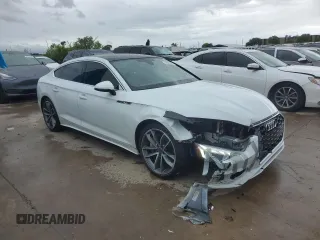 2023 Audi A5 Sportback S line Premium z VIN WAUDACF54PA024628, wystawiony jako Copart lot #49966604 z przebiegiem 15 396 mil mil oraz Czysty tytuł • Clean title. Historia ofert i sprzedaży dostępna na DreamBid. Obrazek 4.