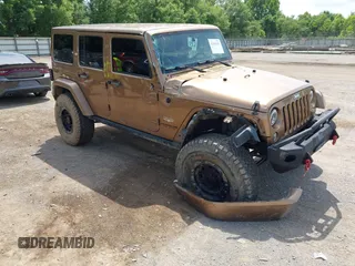 2015 Jeep Wrangler Unlimited Sahara with VIN 1C4BJWEGXFL617671, listed as a IAAI auction lot 42502681 with 76,739 mi miles and . Bid and sale history available at DreamBid. Image 1.