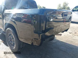 2023 Nissan Frontier Pro-X with VIN 1N6ED1EJ6PN619651, listed as a IAAI auction lot 41838415 with 69,819 mi miles and . Bid and sale history available at DreamBid. Image 18.