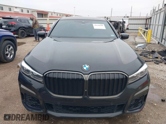2021 BMW 7 Series 740i z VIN WBA7T2C06MCE57381, wystawiony jako IAAI lot #41620500 z przebiegiem 58 326 mil mil oraz . Historia ofert i sprzedaży dostępna na DreamBid. Obrazek 12.