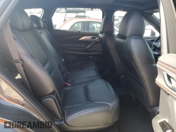 2017 Mazda CX-9 Grand Touring with VIN JM3TCADY0H0130082, listed as a Copart auction lot 56464384 with 115,078 mi miles and Salvage title. Bid and sale history available at DreamBid. Image 11.