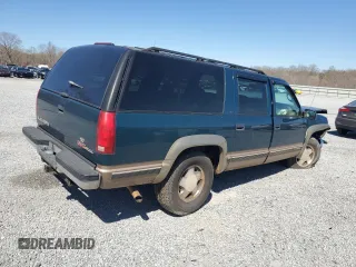1997 GMC Suburban z VIN 1GKFK16R0VJ749323, wystawiony jako Copart lot #50222125 z przebiegiem 209 355 mil mil oraz Szkody całkowita. Historia ofert i sprzedaży dostępna na DreamBid. Obrazek 3.