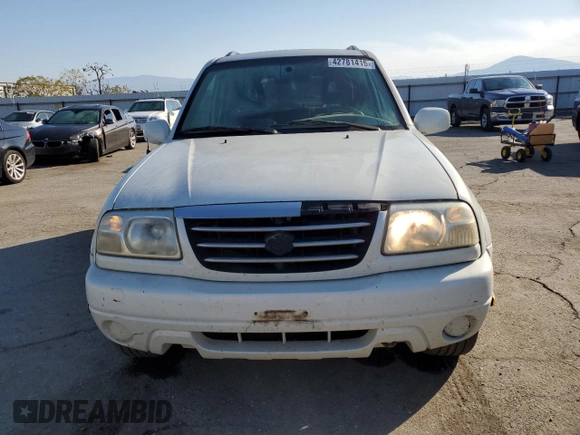 2002 Suzuki XL7 Standard z VIN JS3TX92VX24118298, wystawiony jako Copart lot #42781415 z przebiegiem 312 010 mil mil oraz Szkoda całkowita • Salvage title. Historia ofert i sprzedaży dostępna na DreamBid. Obrazek 5.
