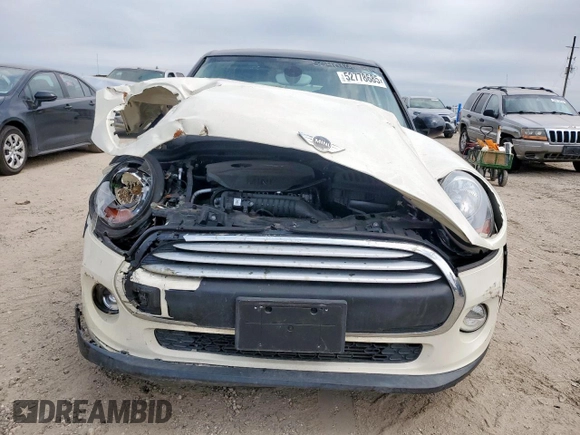 2015 MINI Hardtop 4 Door with VIN WMWXS5C51FT831167, listed as a Copart auction lot 52778685 with 52,770 mi miles and Salvage title. Bid and sale history available at DreamBid. Image 5.