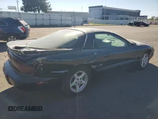 2001 Pontiac Firebird Firebird z VIN 2G2FS22K412122783, wystawiony jako Copart lot #73865114 z przebiegiem 131 320 mil mil oraz Szkoda całkowita • Salvage title. Historia ofert i sprzedaży dostępna na DreamBid. Obrazek 3.