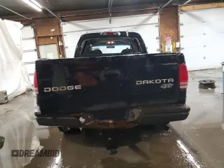 2004 Dodge Dakota Sport z VIN 1D7HG38KX4S782636, wystawiony jako Copart lot #88805195 z przebiegiem 151 620 mil mil oraz Szkoda całkowita • Salvage title. Historia ofert i sprzedaży dostępna na DreamBid. Obrazek 6.