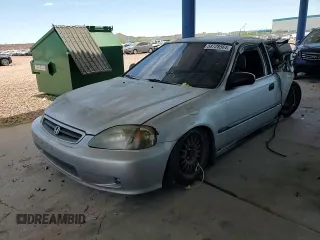 1999 Honda Civic DX with VIN 1HGEJ6125XL086017, listed as a Copart auction lot 58728564 with 262,100 mi miles and Salvage Title. Bid and sale history available at carsss.com. Image 11.