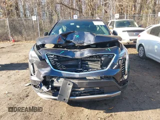 2022 Cadillac XT4 AWD Premium Luxury with VIN 1GYFZDR40NF139931, listed as a IAAI auction lot 41168482 with 28,748 mi miles and . Bid and sale history available at carsss.com. Image 12.