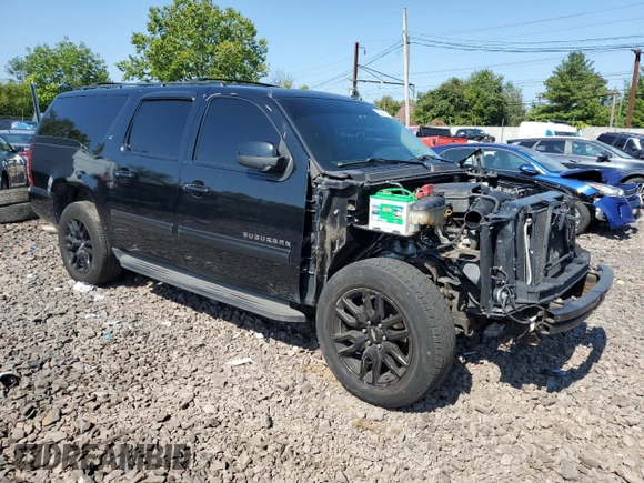 2014 Chevrolet Suburban LT with VIN 1GNSKJE72ER131763, listed as a Copart auction lot 69026754 with 186,248 mi miles and Salvage Title. Bid and sale history available at carsss.com. Image 4.