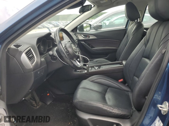 2017 Mazda 3 Touring with VIN 3MZBN1V77HM123452, listed as a Copart auction lot 57786485 with 117,811 mi miles and Salvage title. Bid and sale history available at DreamBid. Image 7.