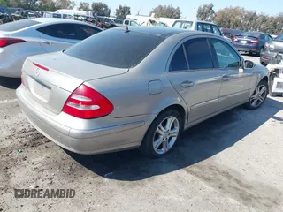 2006 Mercedes-Benz E-Class 3.5L with VIN WDBUF56J96A838185, listed as a IAAI auction lot 41981543 with 213,431 mi miles. Bid and sale history available at carsss.com. Image 4.