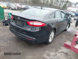 2016 Ford Fusion SE with VIN 3FA6P0HD7GR401848, listed as a IAAI auction lot 41687024 with 124,374 mi miles. Bid and sale history available at carsss.com. Image 4.