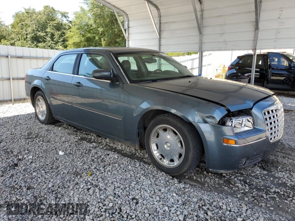 2005 Chrysler 300 Touring z VIN 2C3JA53G65H574021, wystawiony jako Copart lot #70073414 z przebiegiem 291 219 mil mil oraz Szkoda całkowita • Salvage title. Historia ofert i sprzedaży dostępna na DreamBid. Obrazek 4.