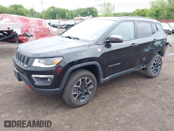 2019 Jeep Compass Trailhawk with VIN 3C4NJDDB7KT727762, listed as a IAAI auction lot 42299260 with 56,733 mi miles and . Bid and sale history available at DreamBid. Image 19.
