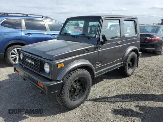 1986 Suzuki Samurai z VIN JS3JC51V8G4110639, wystawiony jako Copart lot #75466894 z przebiegiem Nie podano mil oraz Szkody całkowita. Historia ofert i sprzedaży dostępna na DreamBid. Obrazek 1.