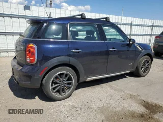 2016 MINI Countryman S with VIN WMWZC5C54GWT38489, listed as a Copart auction lot 63834335 with 102,564 mi miles and Salvage title. Bid and sale history available at DreamBid. Image 3.