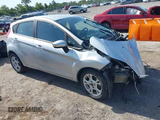 2016 Ford Fiesta SE z VIN 3FADP4EJXGM103722, wystawiony jako IAAI lot #42275038 z przebiegiem 104 689 mil mil oraz . Historia ofert i sprzedaży dostępna na DreamBid. Obrazek 1.