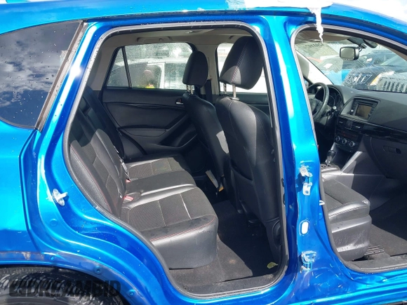 2013 Mazda CX-5 Grand Touring with VIN JM3KE4DE4D0123837, listed as a IAAI auction lot 42031074 with 121,818 mi miles. Bid and sale history available at carsss.com. Image 8.