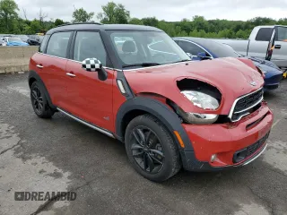 2015 MINI Countryman S with VIN WMWZC5C54FWP42858, listed as a Copart auction lot 60684185 with 83,163 mi miles and Salvage title. Bid and sale history available at DreamBid. Image 4.
