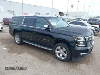 2015 Chevrolet Suburban LTZ with VIN 1GNSCKKC3FR157939, listed as a IAAI auction lot 41168203 with 197,810 mi miles and . Bid and sale history available at DreamBid. Image 1.