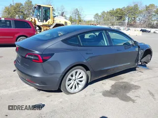 2022 Tesla Model 3 Long Range with VIN 5YJ3E1EB3NF290550, listed as a IAAI auction lot 41826287 with 67,648 mi miles and . Bid and sale history available at DreamBid. Image 4.