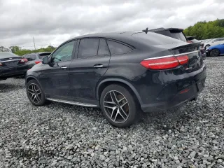 2019 Mercedes-Benz GLE 43 AMG with VIN 4JGED6EB5KA137564, listed as a Copart auction lot 57213595 with 104,144 mi miles and Salvage title. Bid and sale history available at DreamBid. Image 2.