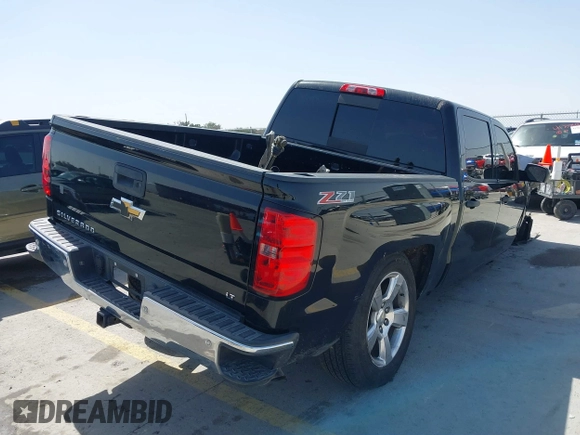 2014 Chevrolet Silverado 1500 LT with VIN 3GCUKREH8EG210945, listed as a IAAI auction lot 41718435 with 106,320 mi miles and . Bid and sale history available at DreamBid. Image 4.