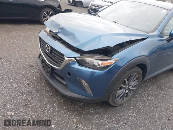 2018 Mazda CX-3 Touring with VIN JM1DKFC78J0322460, listed as a IAAI auction lot 41730662 with 58,841 mi miles. Bid and sale history available at carsss.com. Image 6.