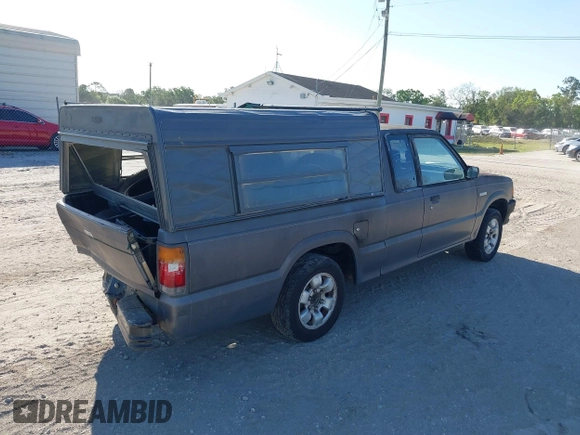 1992 Mazda B-Series Truck with VIN JM2UF3136N0270881, listed as a IAAI auction lot 41814384 with 202,785 mi miles and . Bid and sale history available at DreamBid. Image 4.