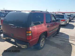 2005 Chevrolet Tahoe LT with VIN 1GNEC13TX5J210767, listed as a IAAI auction lot 42520436 with 528,704 mi miles and . Bid and sale history available at DreamBid. Image 4.